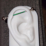Single Line of Gems Titanium Internally Threaded Industrial Barbell